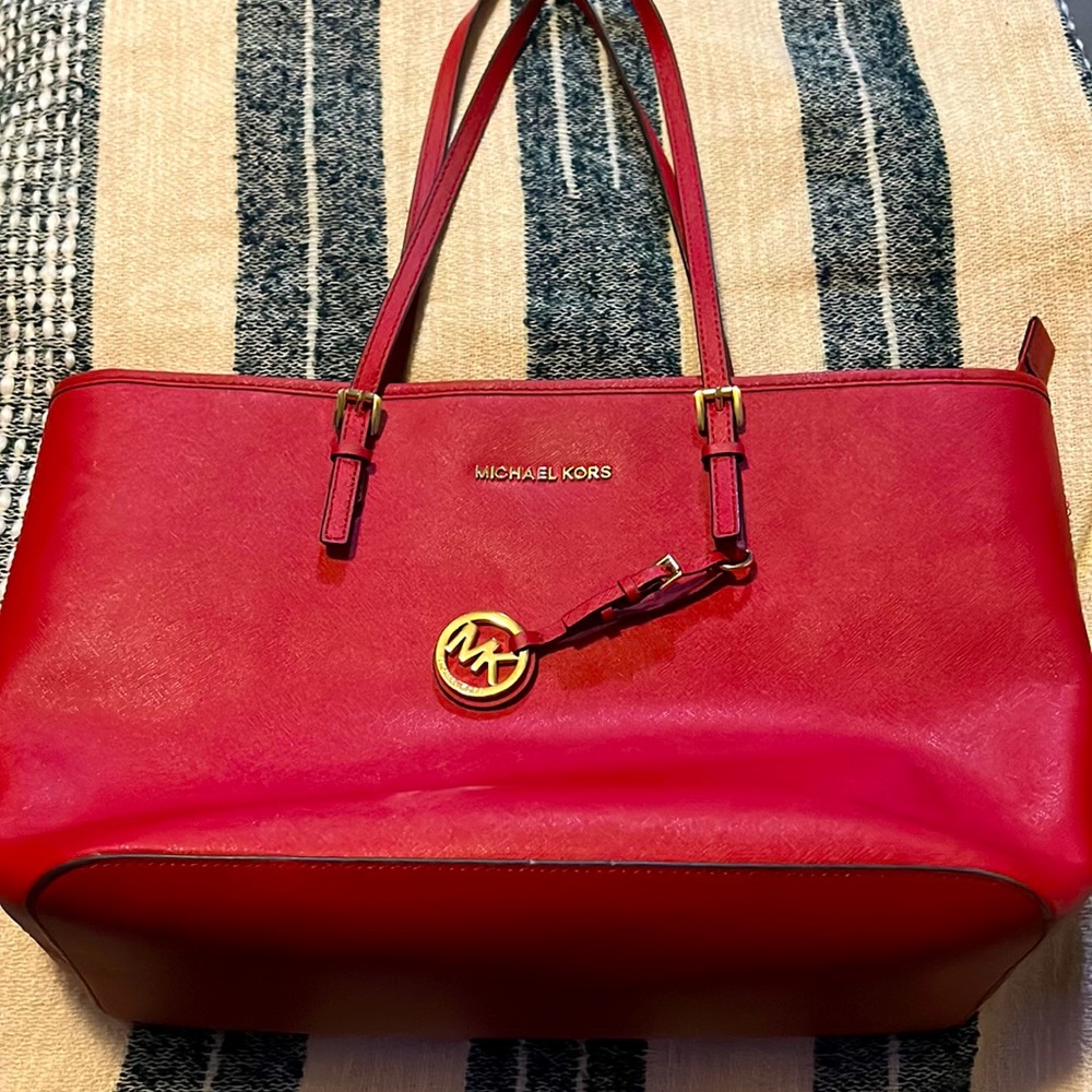 red michael kors purse with matching wallet !